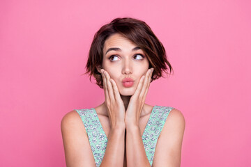 Closeup photo of young funky girl interested touch cheeks looking empty space flirting pouty lips cute isolated on pink color background - obrazy, fototapety, plakaty