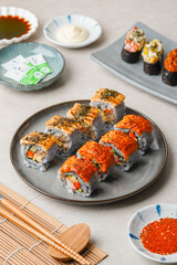 sushi is a Japanese dish of prepared vinegared rice, usually with some sugar and salt, accompanied by a variety of ingredients such as seafood, often raw and vegetables.