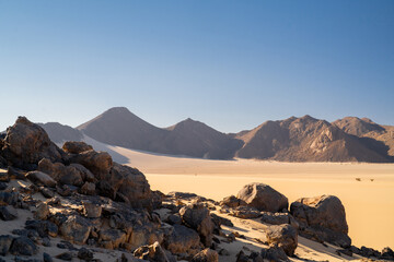 view in the Sahara desert of Tadrart rouge tassili najer in Djanet City  ,Algeria.colorful orange sand, rocky mountains