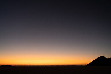 view in the Sahara desert of Tadrart rouge tassili najer in Djanet City  ,Algeria.colorful orange sand, rocky mountains