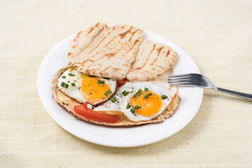 Sunny side up with pita bread