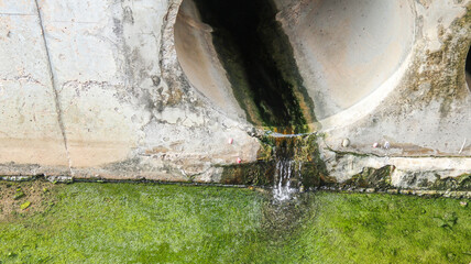 Waste water flowing out of drainage sewage pipes into public canal with out any treatment in a...