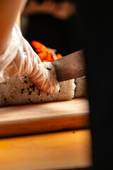 sushi is a Japanese dish of prepared vinegared rice, usually with some sugar and salt, accompanied by a variety of ingredients such as seafood, often raw and vegetables.