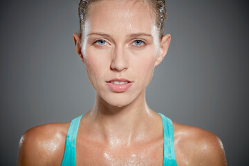 Portrait of sweating young woman.