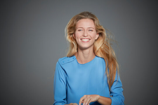 Portrait of smiling young woman.