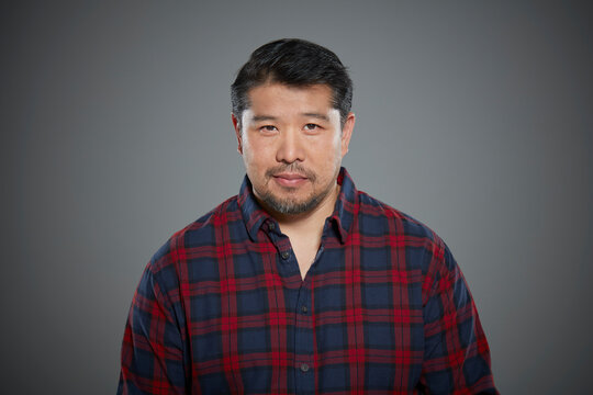 Portrait Of Man Wearing Flannel Shirt.