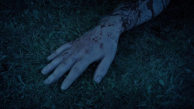 Bloody Arm On Ground In The Dark