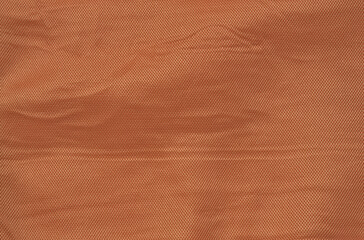 orange crumpled fabric texture background (fine mesh fabric with vignette, lines, checkered herringbone box pattern) cream