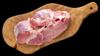fresh raw pork meat in natural olive wood cutting board isolated on black background, ingredient for cooking, top view, flat lay