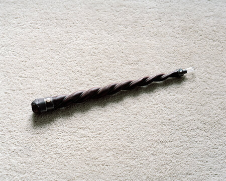 Drill bit with gemstone