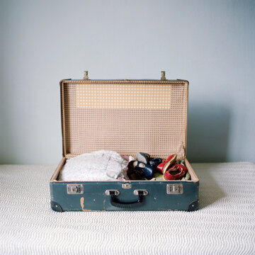Antique clothing in suitcase