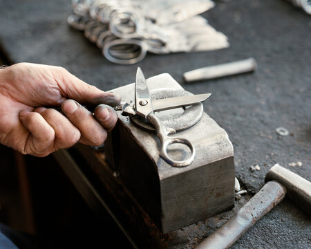 Man's hand making scissors