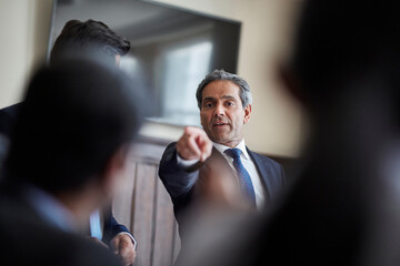 Businessman pointing at meeting