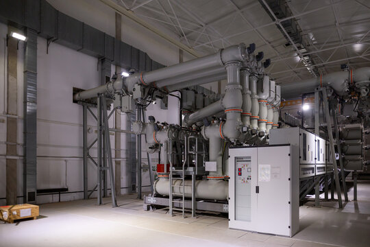 A gas insulated switchgear(GIS) in control building for extra high voltage electrical power substation. Sulfur hexafluoride used in the electrical industry as a gaseous dielectric.