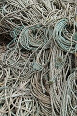 A Collection of Various Coils of Industrial Rope.