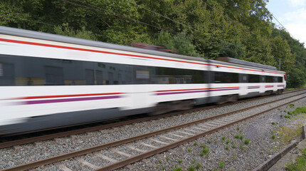 Obraz na płótnie Canvas Passenger train running at high speed