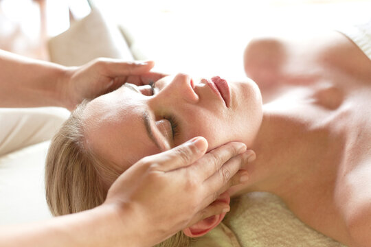 Young woman getting head massage