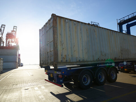 cargo truck leaving dock with load to deliver