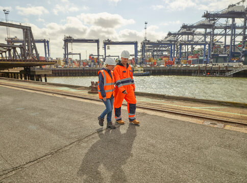 Dock workers walking at Port of Felixstowe, England