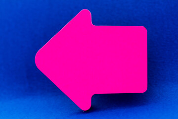 Pink arrow on blue