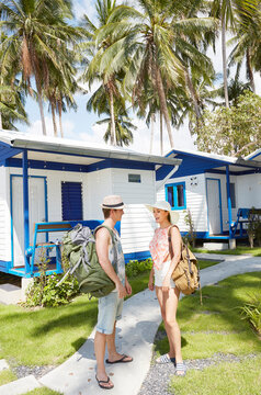 Young couple beside beach hut in Ko Samui, Thailand