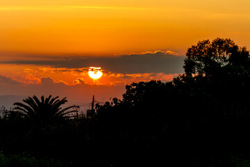 Sunset over tropical landscape