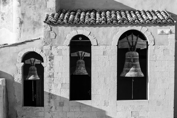 Three church bells in a bell tower