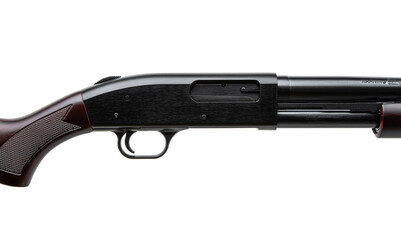 Pump-action 12 gauge shotgun isolated on a white back. A smooth-bore weapon with a wooden stock.