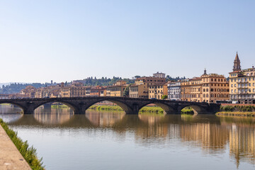 Fototapeta premium View of the Ponte Santa Trinità bridge from the waterfront, Florence, Italy