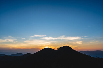Beautiful Sunset view and layers mountains on khao khao chang phueak mountian.Thong Pha Phum National Park's highest mountain is known as Khao Chang Phueak