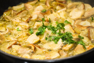Sliced mushrooms in creamy sauce