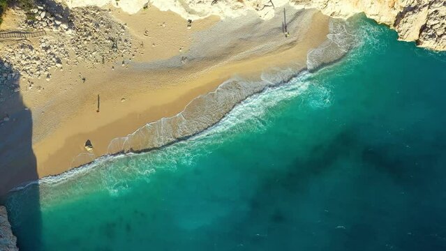 Relaxing aerial beach, summer vacation tropical Mediterranean landscape. Peaceful beach, seaside surf. Waves surf amazing blue ocean lagoon, shore coastline. Beautiful aerial drone top view