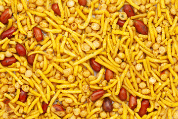 Close-up of Spicy South Mix Indian namkeen (snacks) Full-Frame Background. Top View.