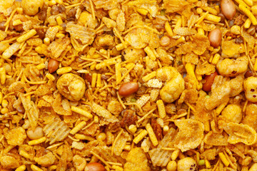 Close-up of Rich and Spicy Makhana Mix Indian namkeen (snacks) Full-Frame Background. Top View.