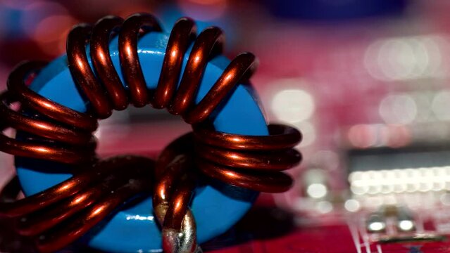 Close up of inductor copper coil on circuit board