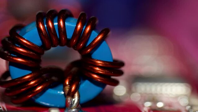 Close up of inductor copper coil on circuit board