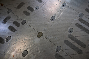 metal fastening holes in an military transport airplane.