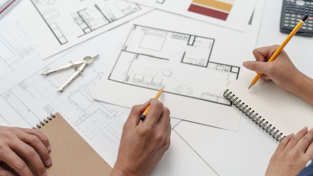 Architect working on the desk, construction project ideas architecture engineer Concept.