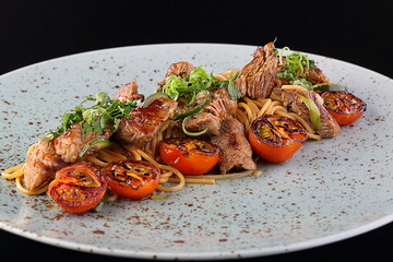 pasta with grilled vegetables, meat and sauce