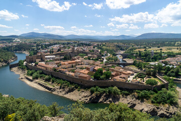 Fototapeta na wymiar Panoramic view of the town of Buitrago del Lozoya. Its walled enclosure remains in a complete state. Community of Madrid, Spain.
