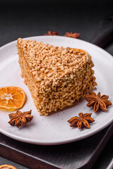 Delicious sweet puff waffle cake with cream and nuts cut into pieces