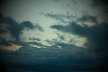 Obraz premium Clearing sky after rain.Natura background, clouds at sunset.