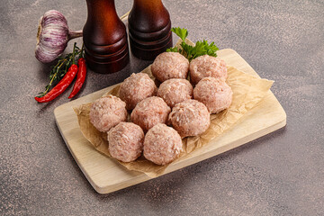Raw homemade meatball for cooking