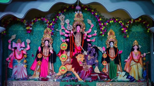 Colorful sculpture of Bangali Goddess Durga and other goddesses in Pandal.
