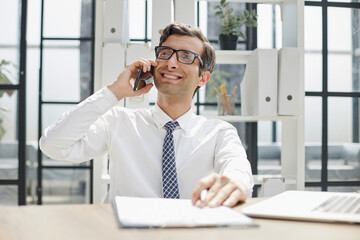 Man accountant or business lawyer talking on smartphone