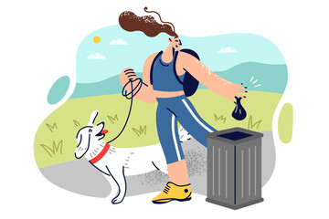 Woman walking dog throws pet poop into trash can, showing social responsibility and care for nature
