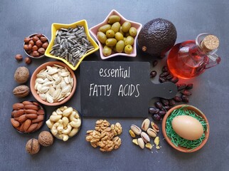 Food high in linoleic acid. Natural food sources of omega 6 and omega 3 essential fatty acids. Healthy fats - nuts, seeds, oils, vegetable; concept of healthy and balanced diet. - obrazy, fototapety, plakaty