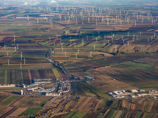 Aerial view of the many wind turbines that generate electricity in the vicinity of the Austrian capital - 633148029