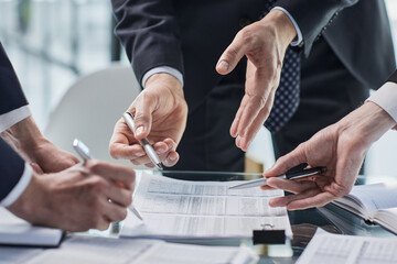 men close-up, looking in a folder with documents