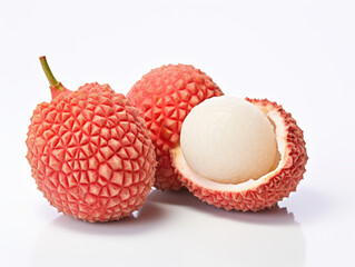 A close up of a litchi fruit on a white surface. Digital image.